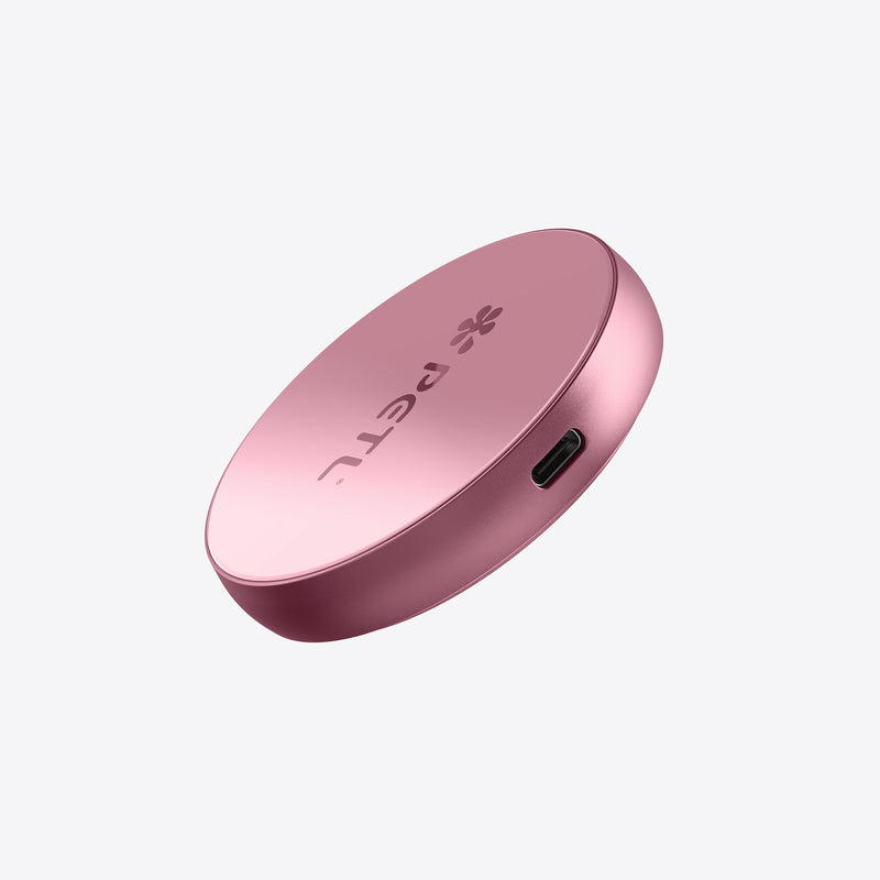 PETL MagSafe battery pack in pink with USB-C port, shown at an angle against a light background.
