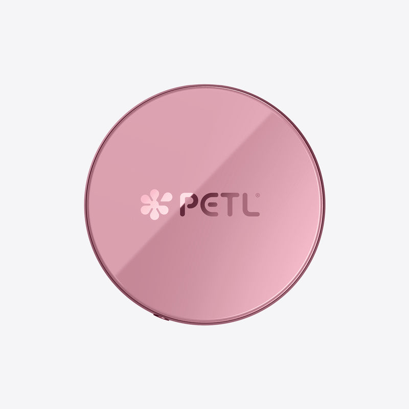 PETL MagSafe battery pack in pink with logo displayed on the circular device.