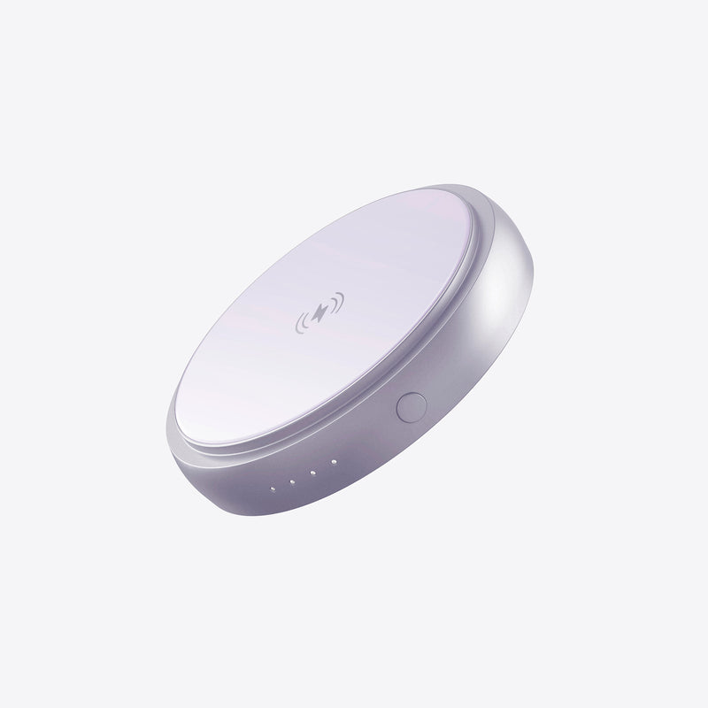 PETL MagSafe battery pack in lavender with wireless charging coil and LED indicators on white background.
