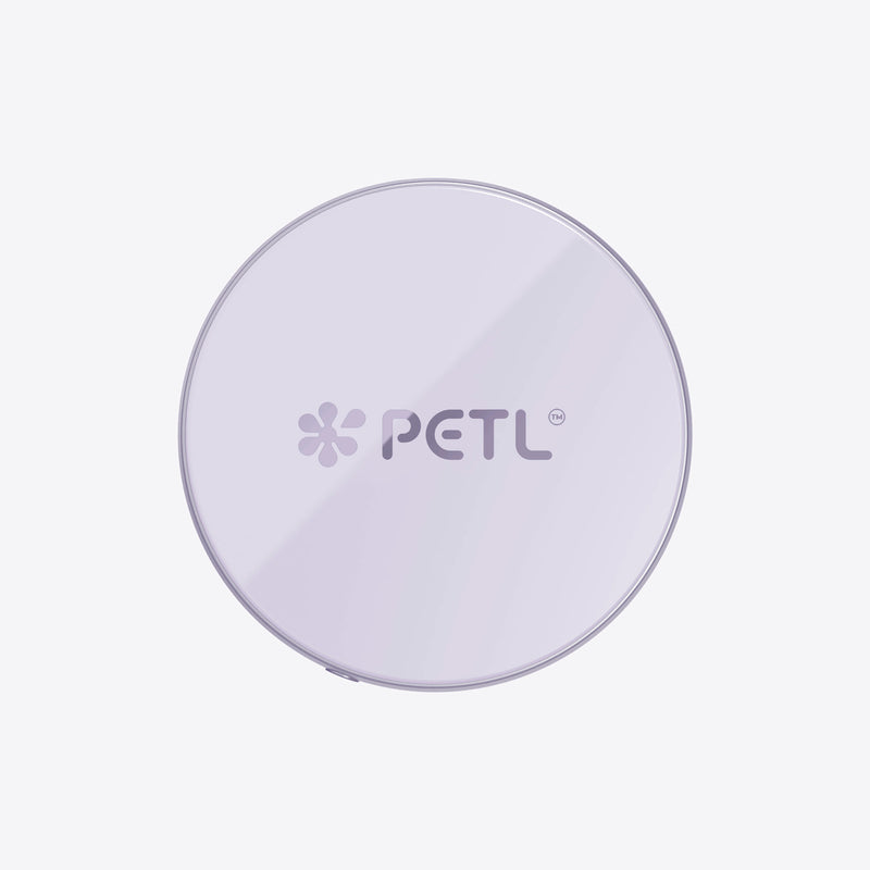 PETL MagSafe battery pack in lavender with logo displayed on circular device.