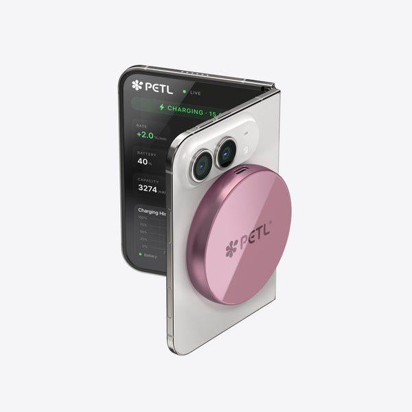 PETL MagSafe battery pack in mauve pink shown front and side view attached to a white smartphone.